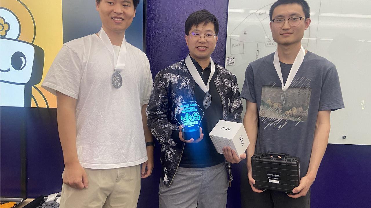 SF Bay Area LeRobot Hackathon winners with trophy